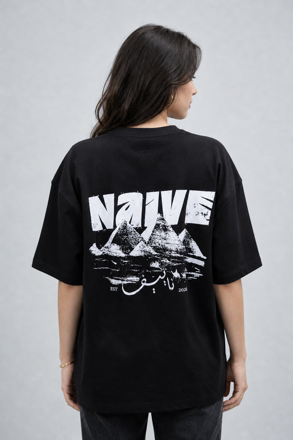 NAIVE Pyramids Black Tee - black oversized t-shirt with NAIVE x Pyramids of Giza print - back view on female model